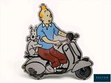 a man riding a scooter with a dog on the back