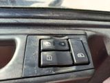 a close up of a car ' s dashboard with a remote control