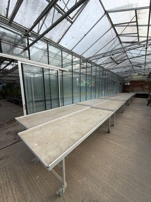 a long table in the middle of a large room