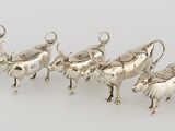 five silver oxen oxen on a white background with a white background