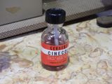 a small bottle of alcohol sitting on a counter