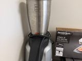a blender that is sitting on a counter next to a box