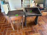 two tables that are sitting on a tile floor