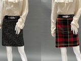 two mannequins dressed in plaid skirts and white blouses