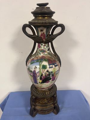 a vase that is sitting on a blue table