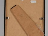 a picture of a piece of cardboard in a black box