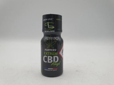 un flacon d'huile de CBD posé sur une table