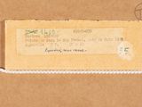 a picture of a piece of brown paper with a tag on it