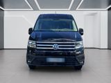 the front view of a blue van parked in a white room