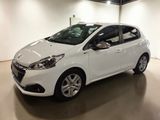 a picture of a white car parked in a garage