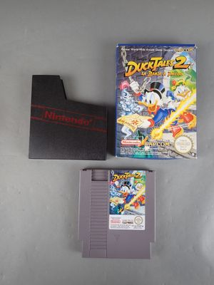 une image représentant un jeu Nintendo avec une boîte et deux jeux
