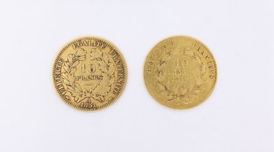 two gold coins, one of which is a sovereign and the other of which is a sovereign