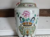a vase that is sitting on top of a radiator