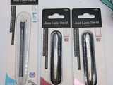 three different types of hairbrushes on the table