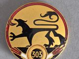 an image of a gold and black badge with a lion on it