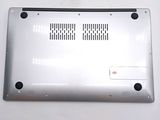 a close up of a silver laptop computer on a table