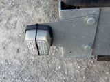 a close up of a metal latch on the side of a truck