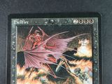 a picture of a card with a picture of a demon on it