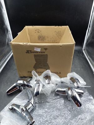 a box that has a bunch of chrome faucets in it