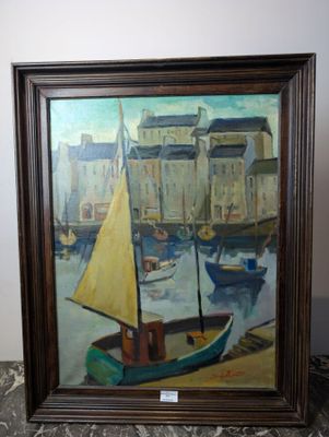a picture of a painting of a sailboat on a table