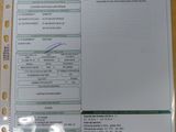 une photo d'un document sur lequel figure la photo d'une personne