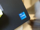 a close up of a laptop with a sticker on it