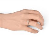 an image of a woman ' s hand with a diamond ring on it
