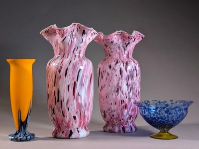 three vases sitting next to each other on a table