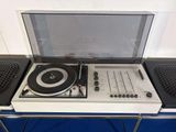 an image of a turntable with speakers and a record player