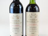 deux bouteilles de vin posées l'une à côté de l'autre sur une surface blanche