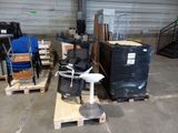a lot of furniture in a warehouse with pallets on the floor