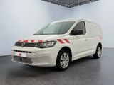 une camionnette blanche avec une bande rouge sur le côté