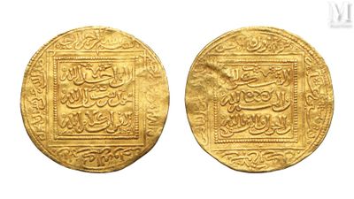 two gold coins with arabic writing on them