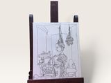 un petit chevalet sur lequel est représentée une femme