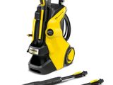 a yellow pressurer with a black hose and a hammer