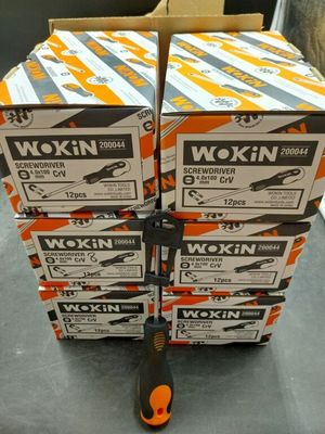 a stack of boxes with a pair of scissors on top of them