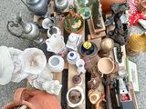 a lot of antiques on the ground next to each other