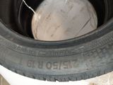 a close up of a tire on a toilet seat