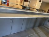 an image of a long counter in a commercial kitchen