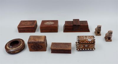several pieces of wood are arranged in a row on a white surface