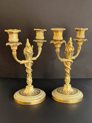 pair of antique brass candelabs with birds and flowers