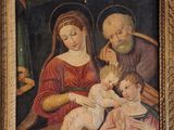 un vieux tableau représentant une famille avec un bébé et un homme âgé