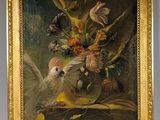 painting of a bird and flowers in a vase on a table