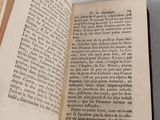 an open book that is sitting on a table