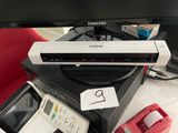 an image of a tv and a remote control on a desk