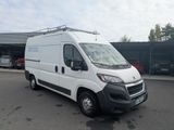 a picture of a white van parked in a parking lot