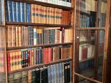 many books on the shelves in the room