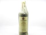 a bottle of wine that is sitting on a table