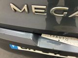 a sticker on the back of a car that says mega