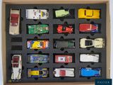 a box with a variety of toy cars in it